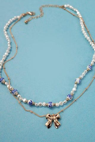 CERAMIC PORCELAIN PEARL BOW LAYER NECKLACE